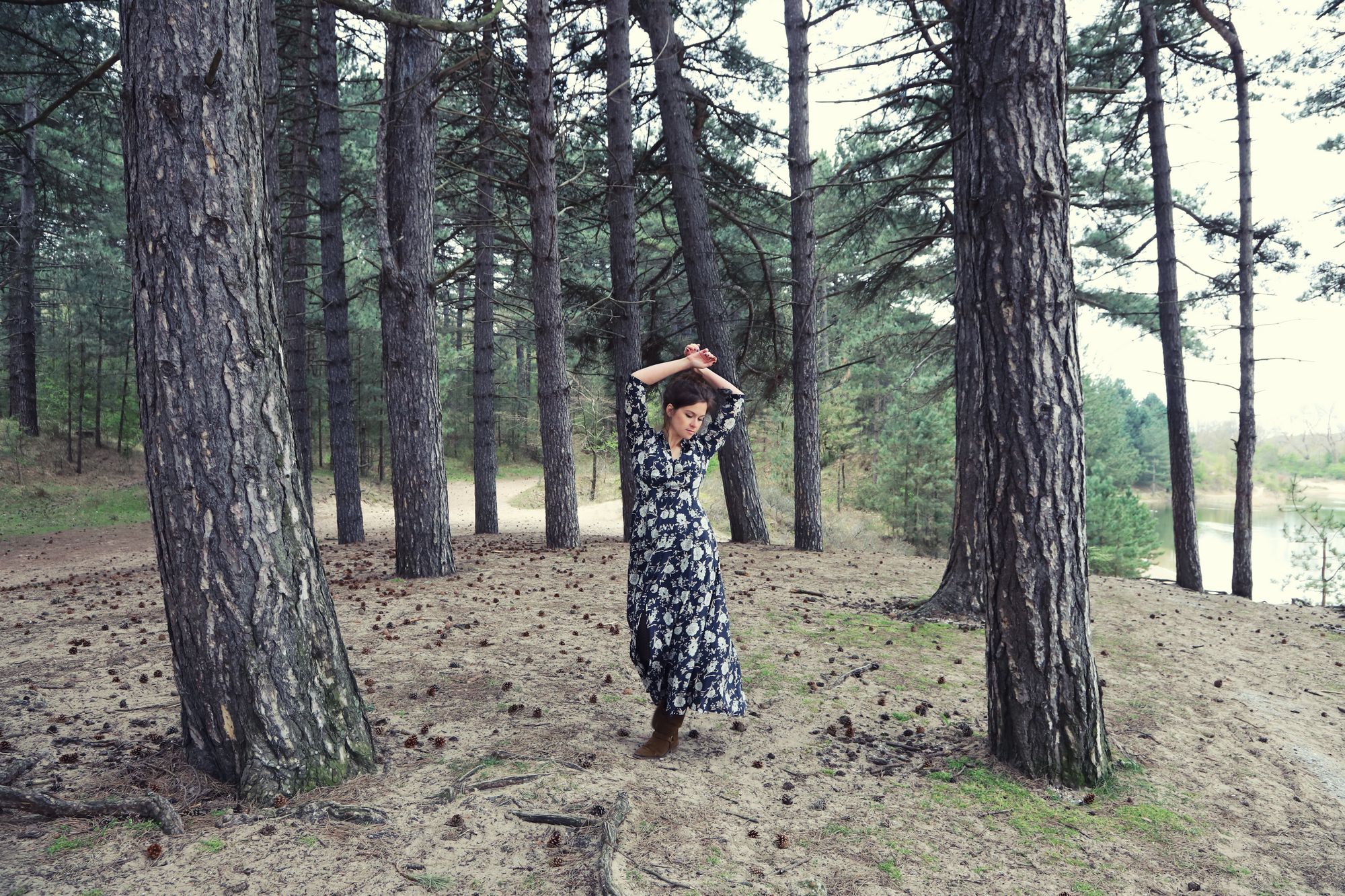 singer songwriter tessa beinfante in the woods photographed by Caroline SIkkenk, flower dress